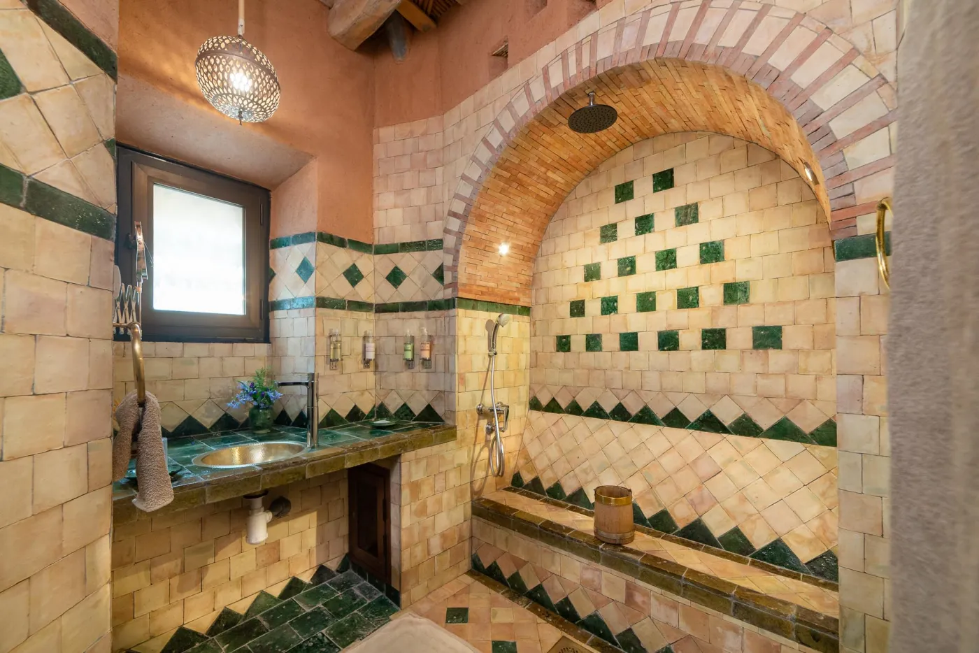 Moroccan guest room with artisan tilework